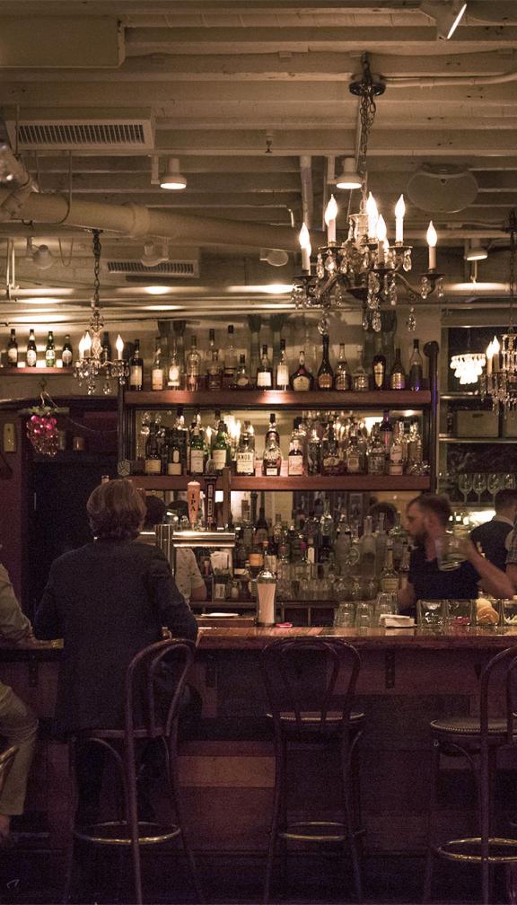 Patrons at a bar