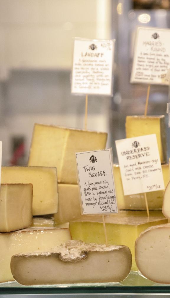 assorted cheeses in store